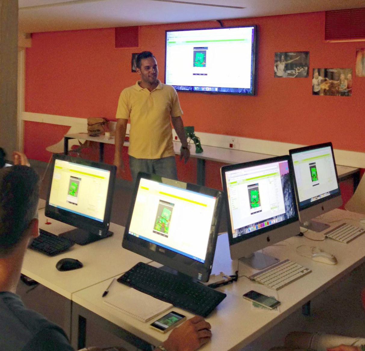 Dimitrios presenting a design prototype during a classroom workshop